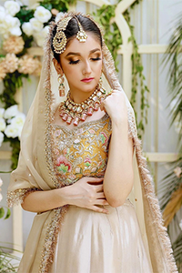 YELLOW BLOSUE GOLDEN LEHENGA